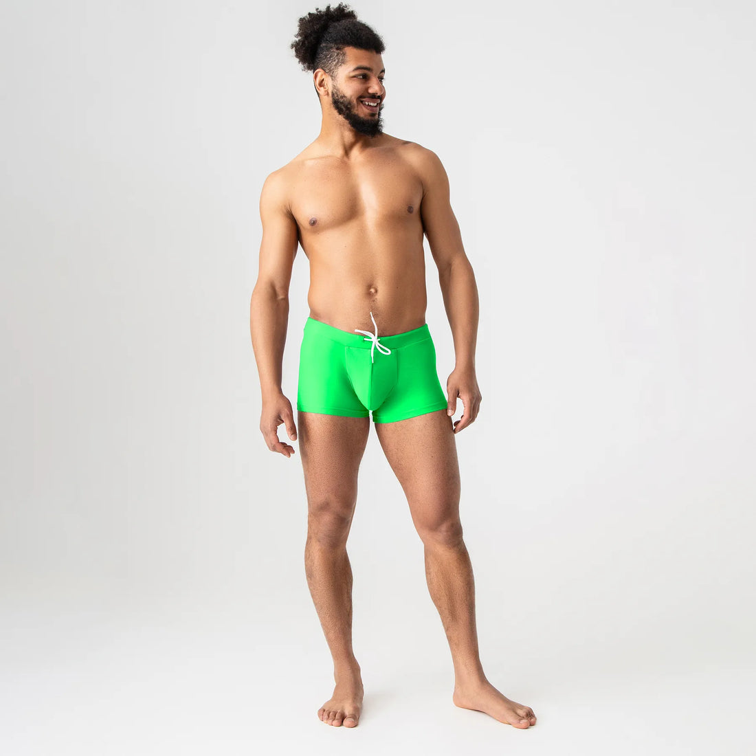 Anatomic Intimate 2.1 green anatomical men’s swim trunks with drawstring waistband, front view