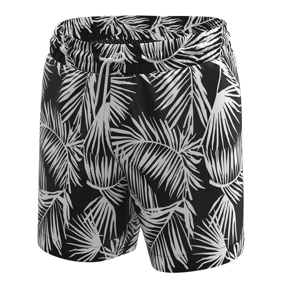 Man’s SET Anatomic Shorts 2.0 in black leaf print, men’s swim shorts with tropical design, front view