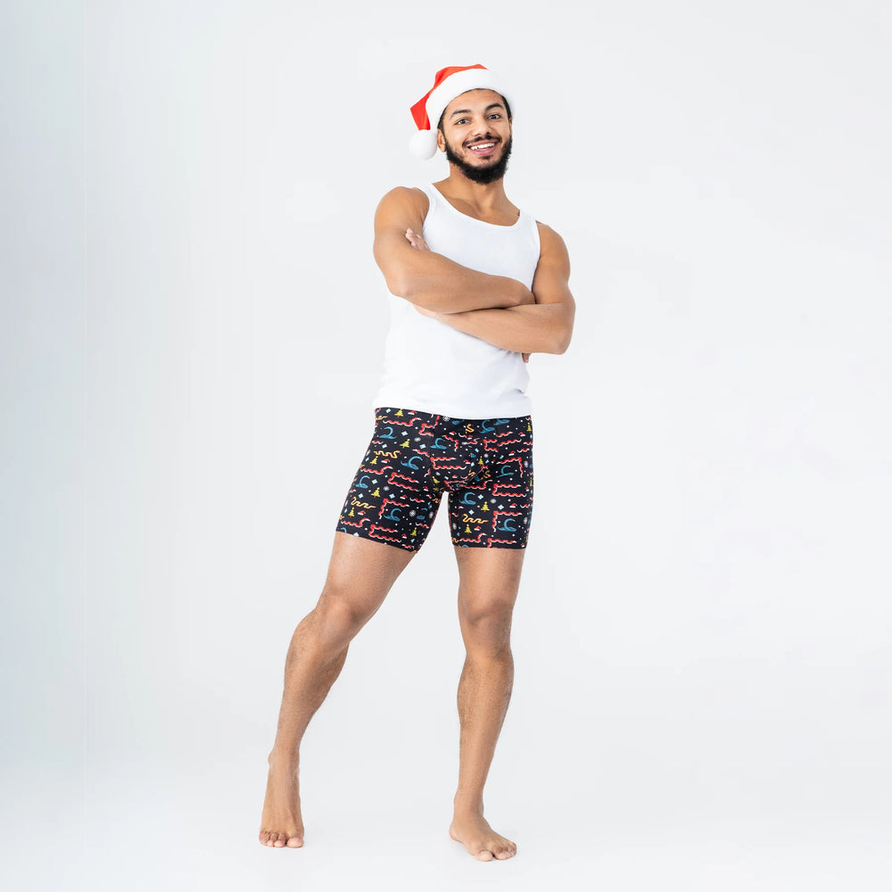 Comfortable men’s underwear by Man’s SET, Snakes holiday print boxer briefs in black, front view