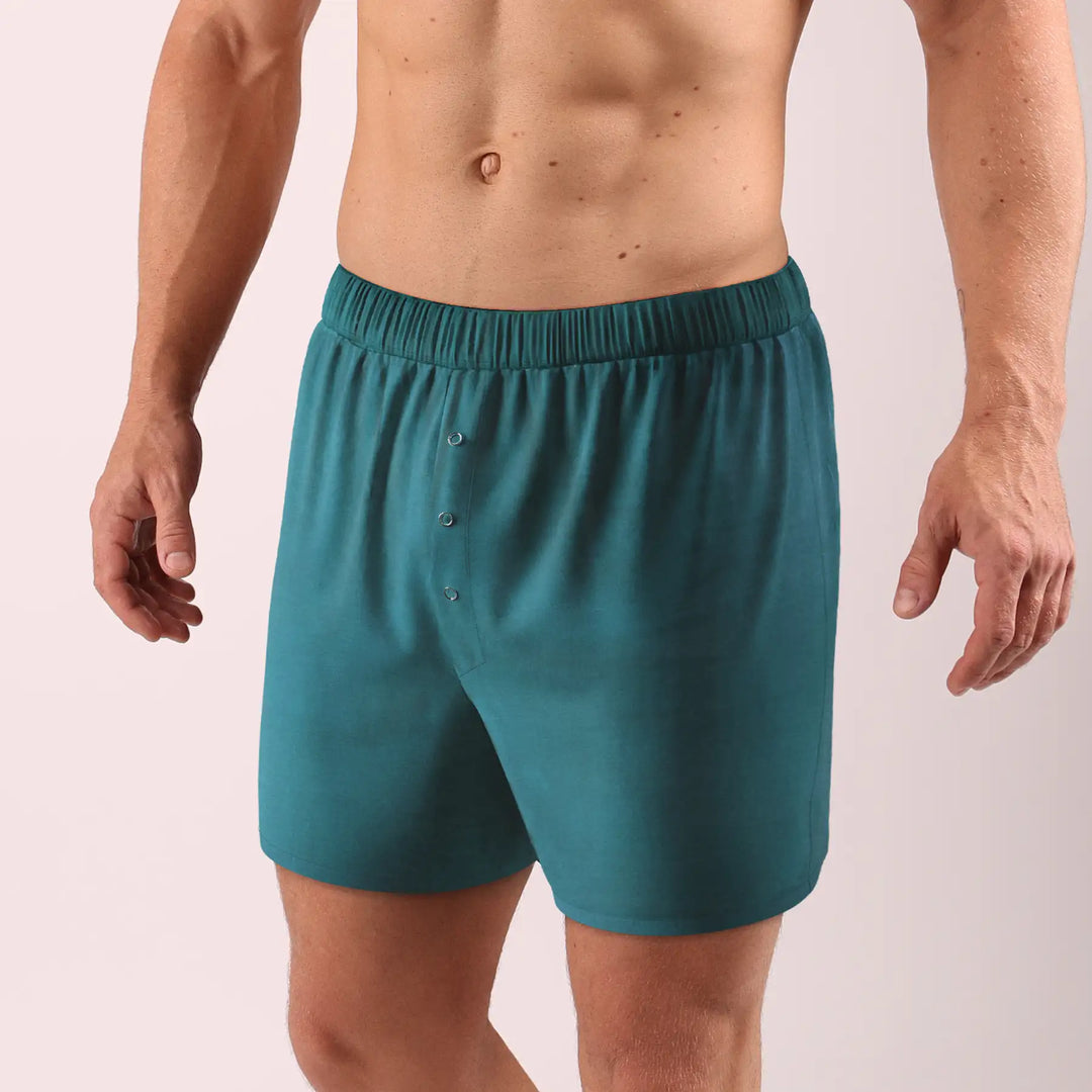Comfortable men’s loose fit boxer shorts in dark aqua cotton by Man’s SET, front view