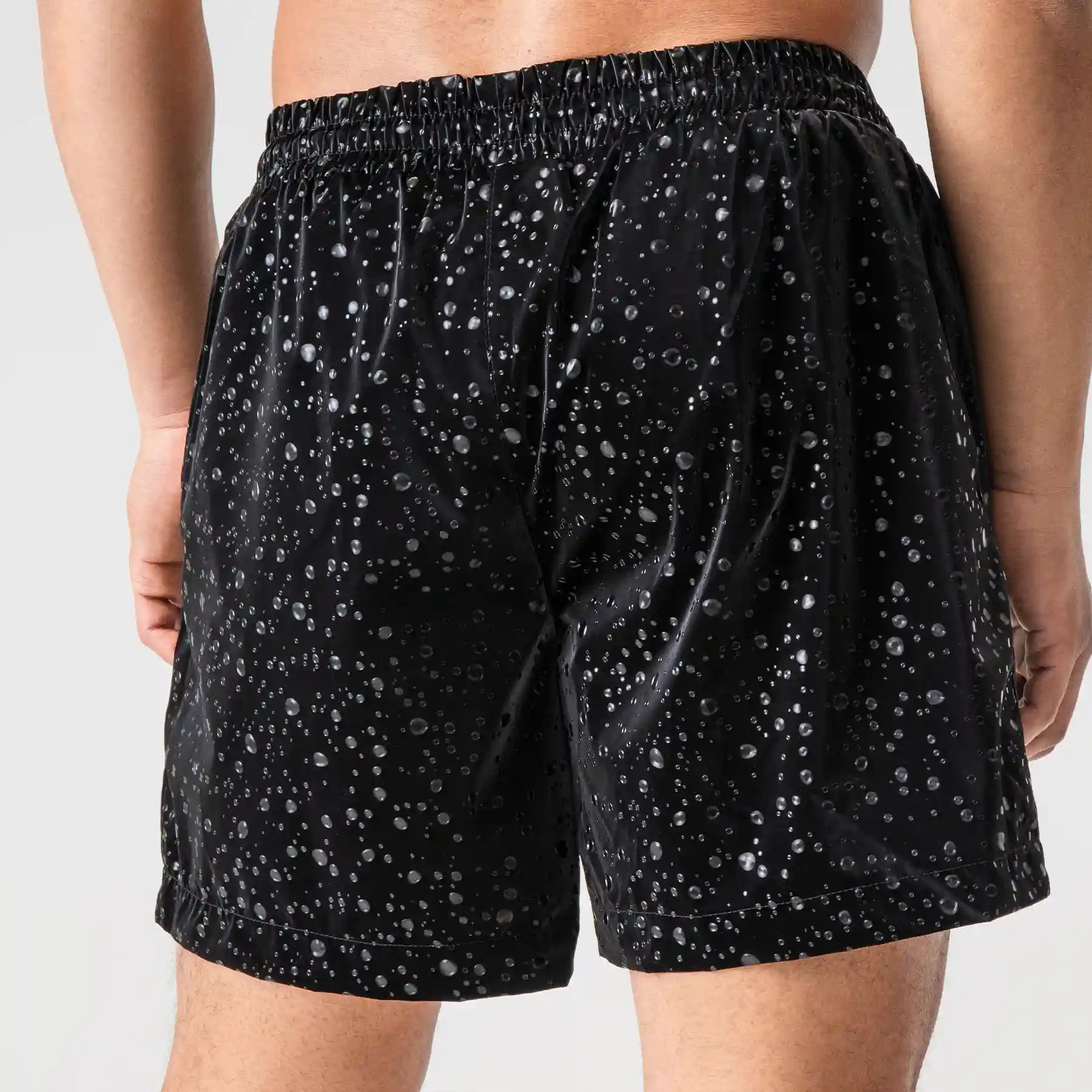 Man’s SET black swim shorts with water drop print, anatomic comfortable swimwear, back view