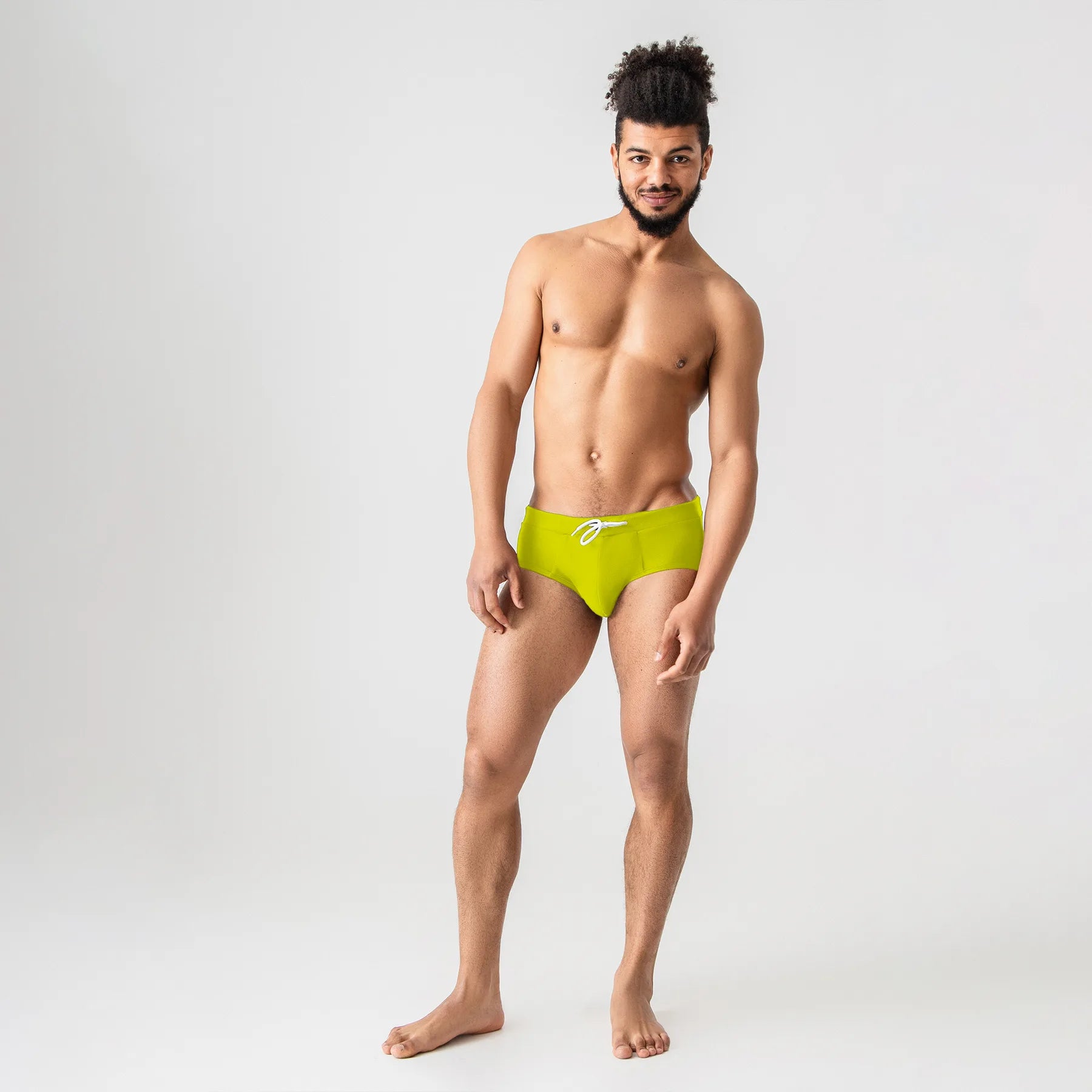 Yellow anatomical men’s swim briefs with drawstring by Man’s SET, front angle view