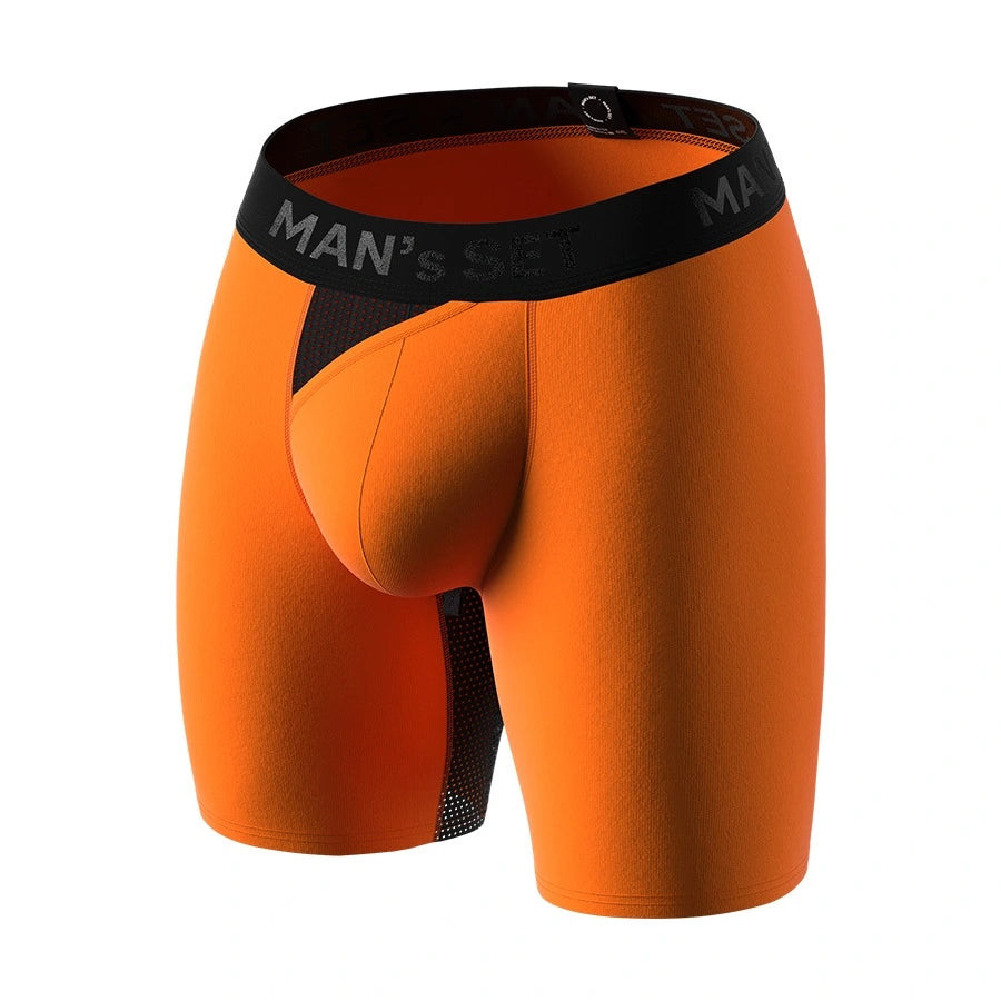 Man’s SET orange long anatomical men’s boxers with skew fly, lightweight plus-size fit, angled view