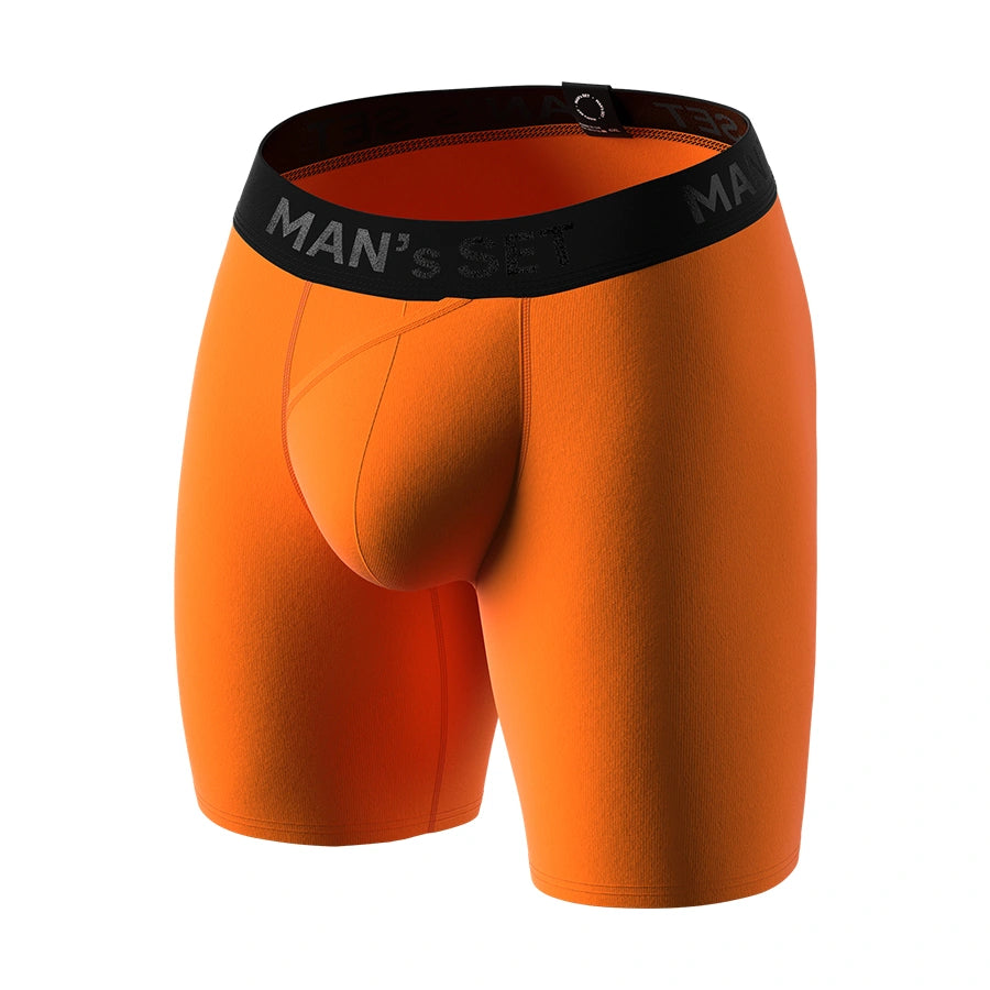 Orange anatomical men’s boxer briefs long with skew fly by Man’s SET, supportive plus-size underwear, angled view
