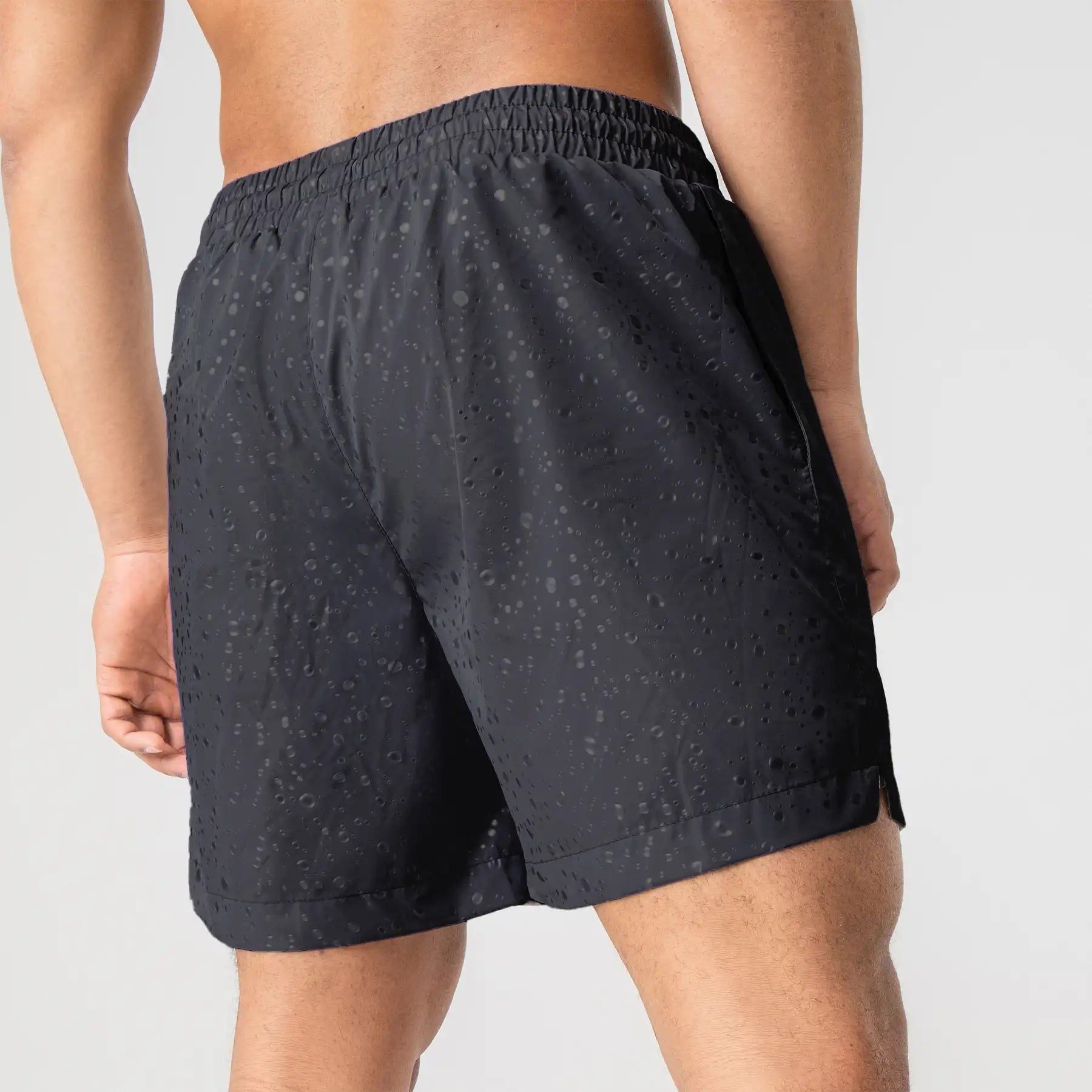 Man’s SET black swim shorts with water drop print, elastic waistband, back view