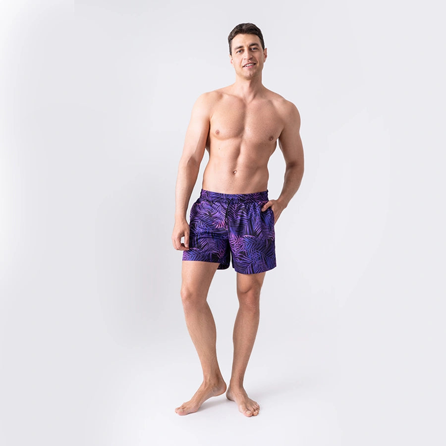 Man’s SET Anatomic Shorts 2.0 in Purple Summer print, stylish men’s swim shorts with tropical pattern, front view