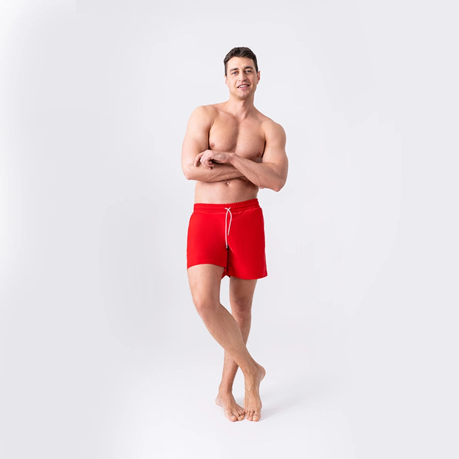 Man’s SET Anatomic Shorts 2.0 in solid red, anatomical men’s swim shorts with drawstring waistband, front view