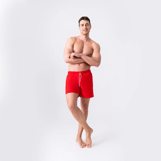 Man’s SET Anatomic Shorts 2.0 in solid red, anatomical men’s swim shorts with drawstring waistband, front view