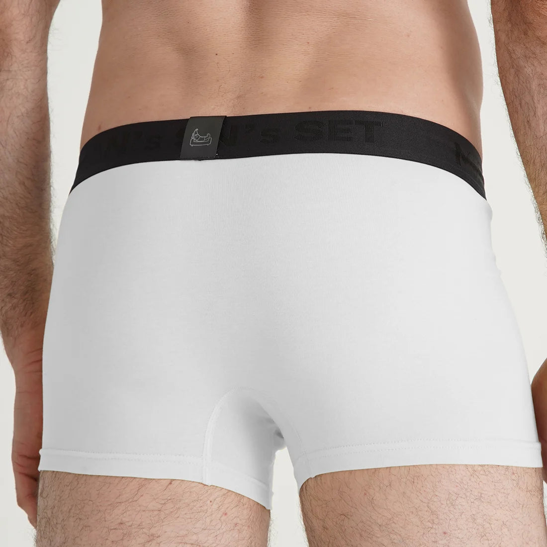 Comfortable men’s underwear by Man’s SET, white PowerStretch trunks with black waistband, back view