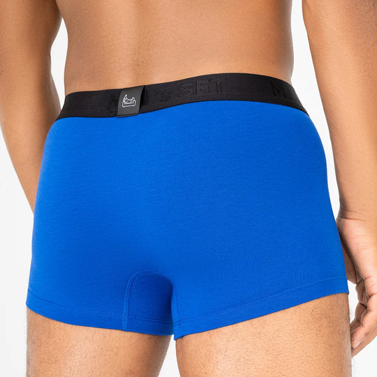 Comfortable men’s underwear by Man’s SET, electric blue Micromodal trunks with black waistband, back view