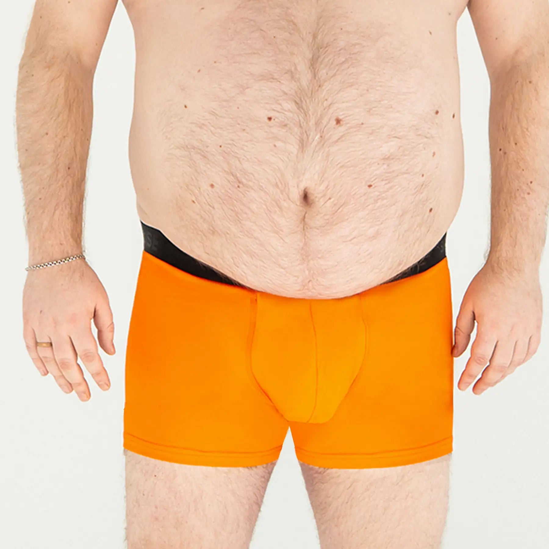 Man’s SET plus-size anatomical men’s boxer briefs in orange, no fly design, front view