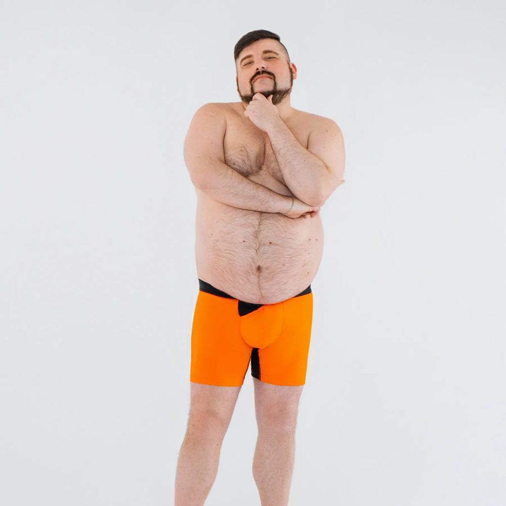Man’s SET plus-size anatomical men’s boxers in orange with skew fly, full front view