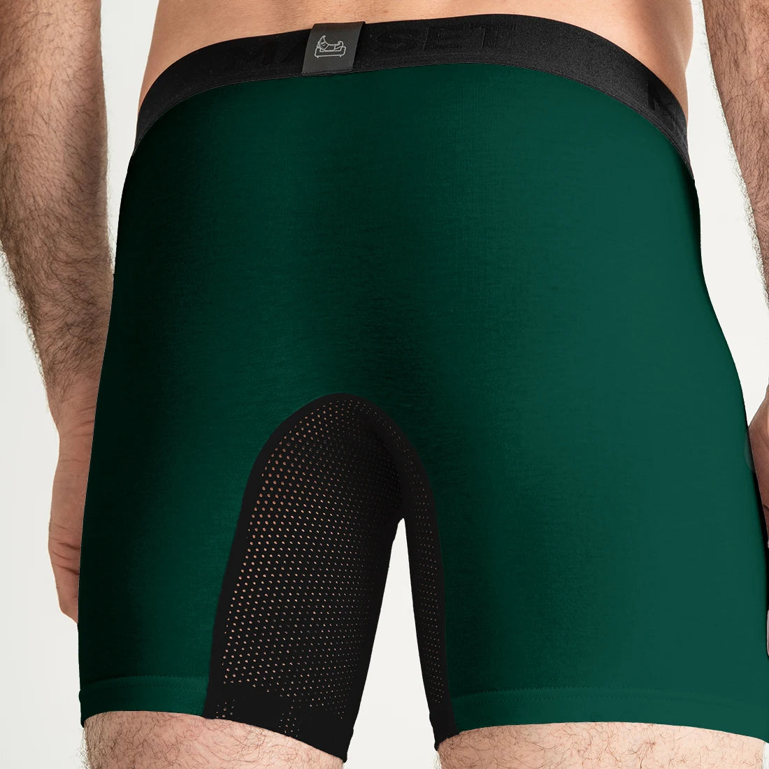 Breathable men’s forest green boxer briefs by Man’s SET, mesh panel detail, back view