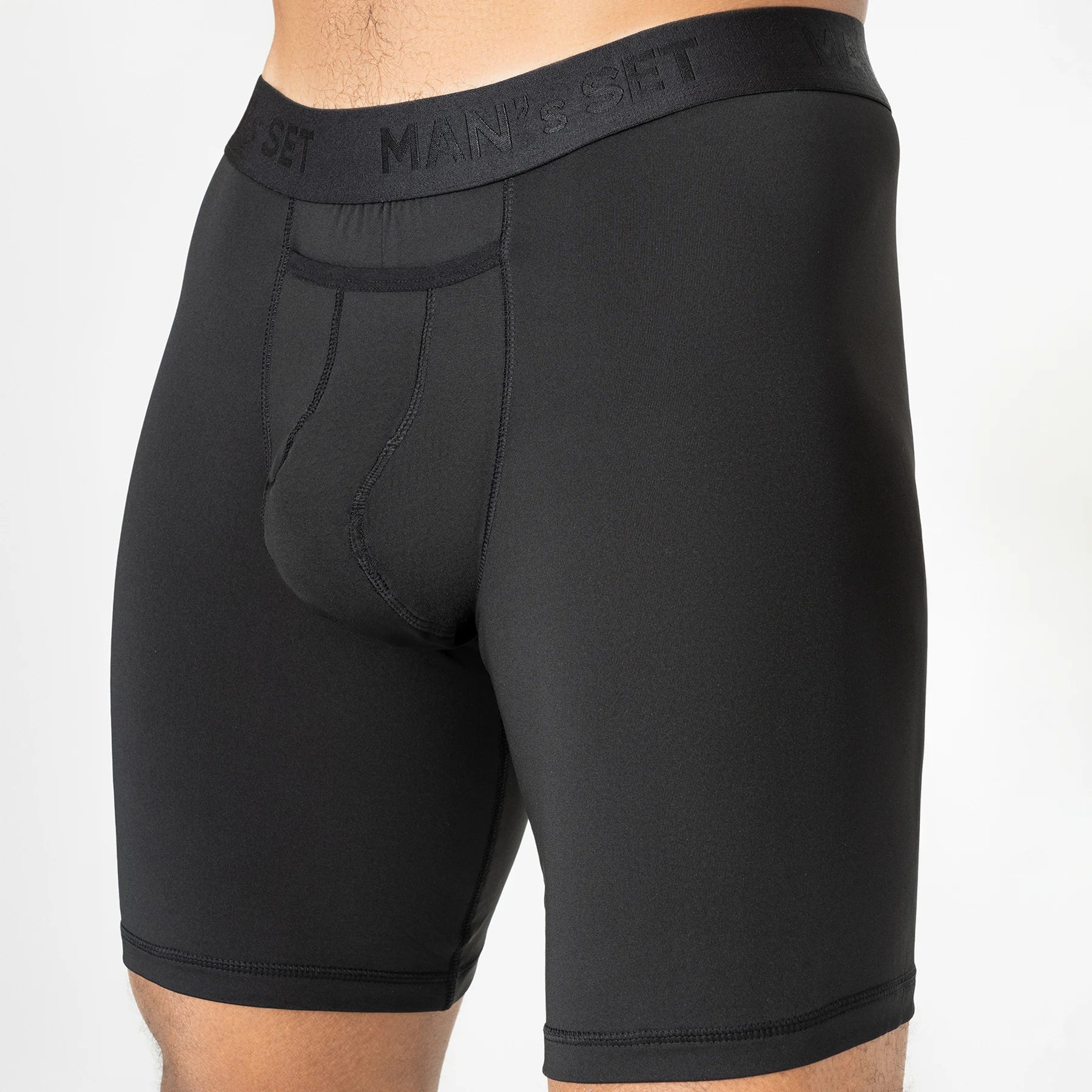 Man’s SET black ProActive 9-inch boxer briefs, breathable performance men’s underwear with open fly, close-up front view