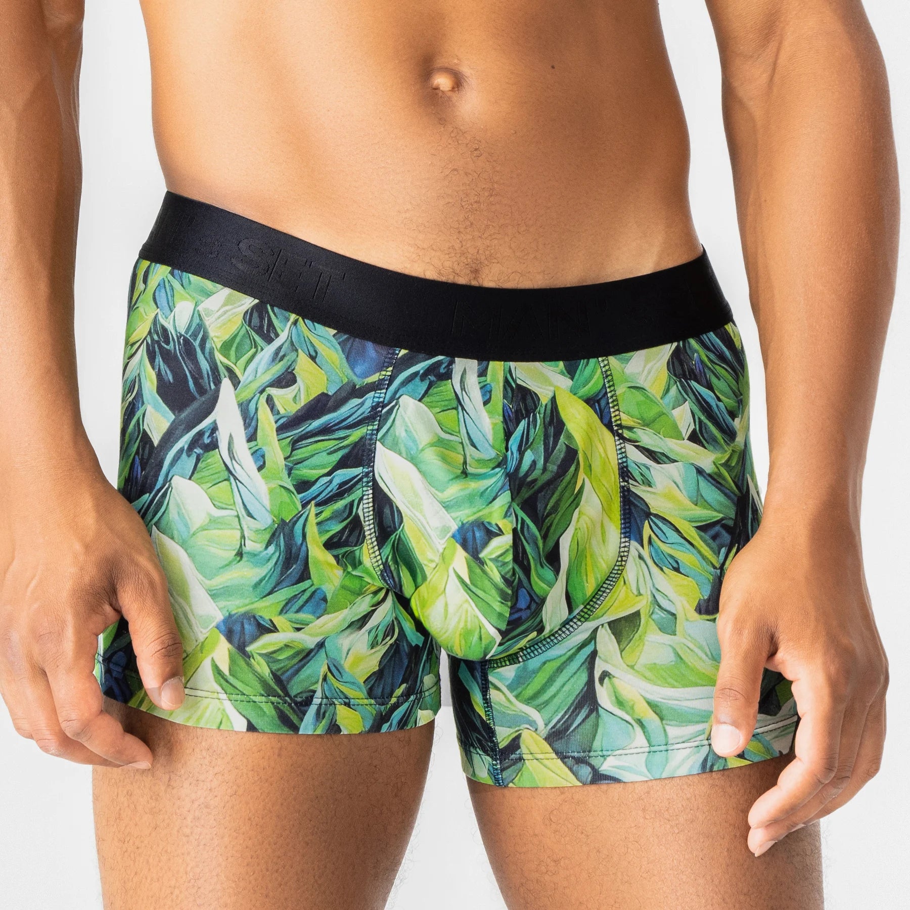 Man’s SET PowerStretch trunk 3.9" with green tropical mountain leaf print, breathable men’s underwear, front close-up view