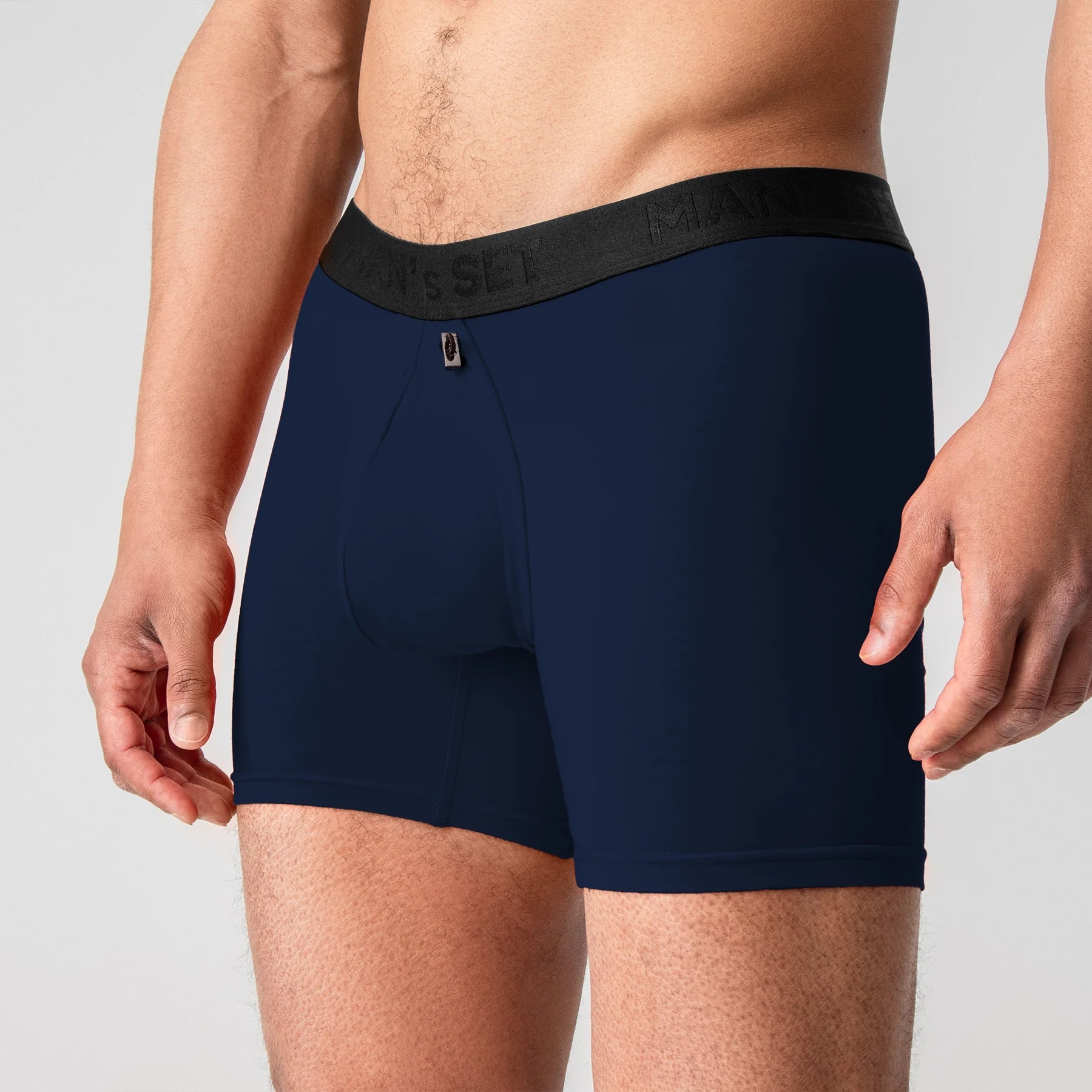 Comfortable men’s navy boxer briefs by Man’s SET, 5.8" length with adjustable pouch, close-up front view