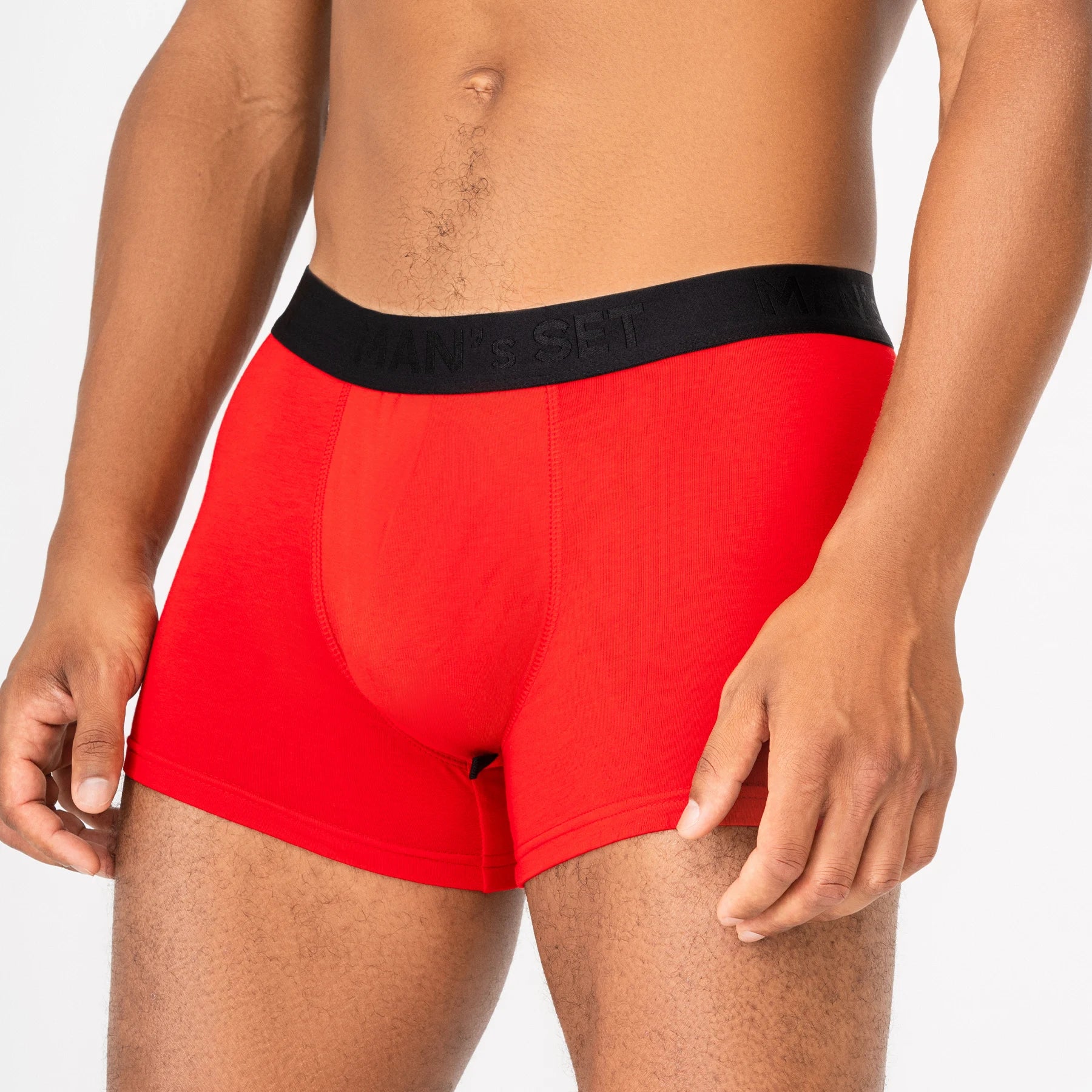 Comfortable men’s underwear by Man’s SET, red micromodal trunks with soft waistband, close-up view