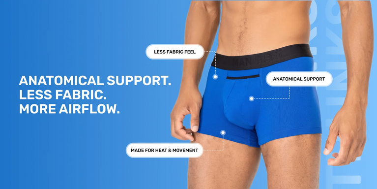 Blue boxer briefs with text highlighting features on a blue background