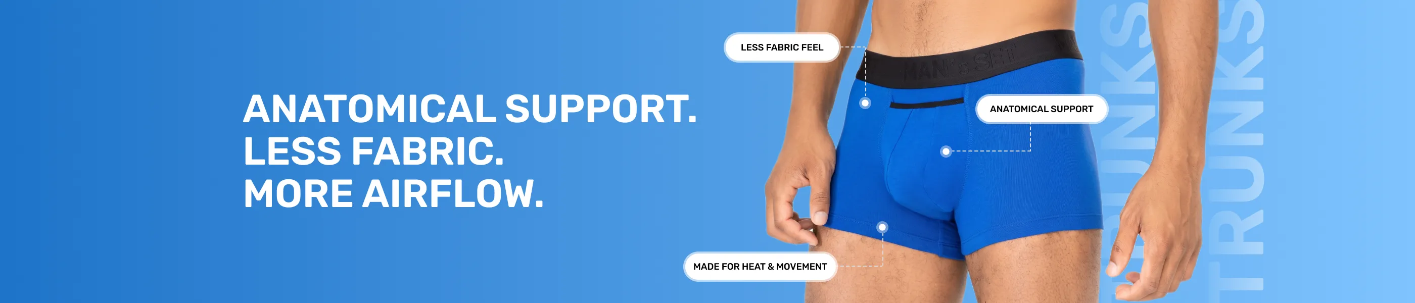 Blue boxer briefs with text on anatomical support and fabric reduction on a blue background
